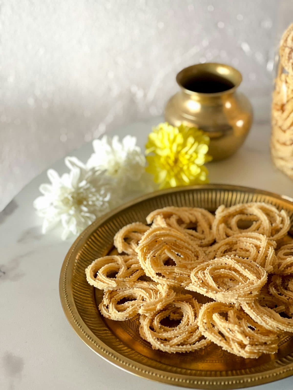 Rice chakli spirals on a brass plate